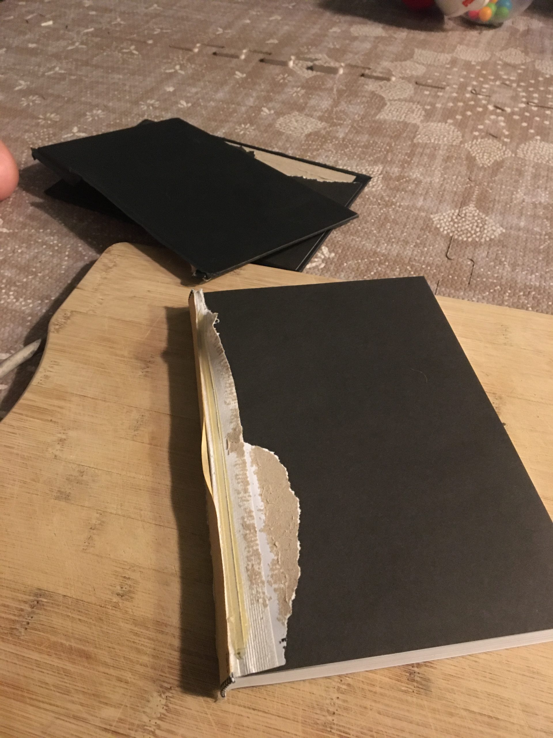 Removing front cover of a physical book